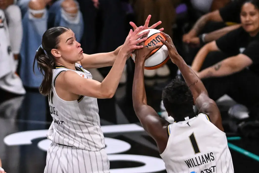 Chicago Sky rookie Gabriela Jaquez, left, and teammate Elizabeth Williams...