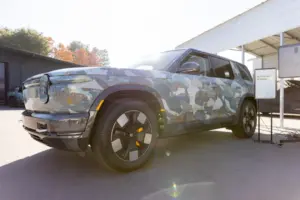 Rivian boosts delivery outlook as EV sales top estimates