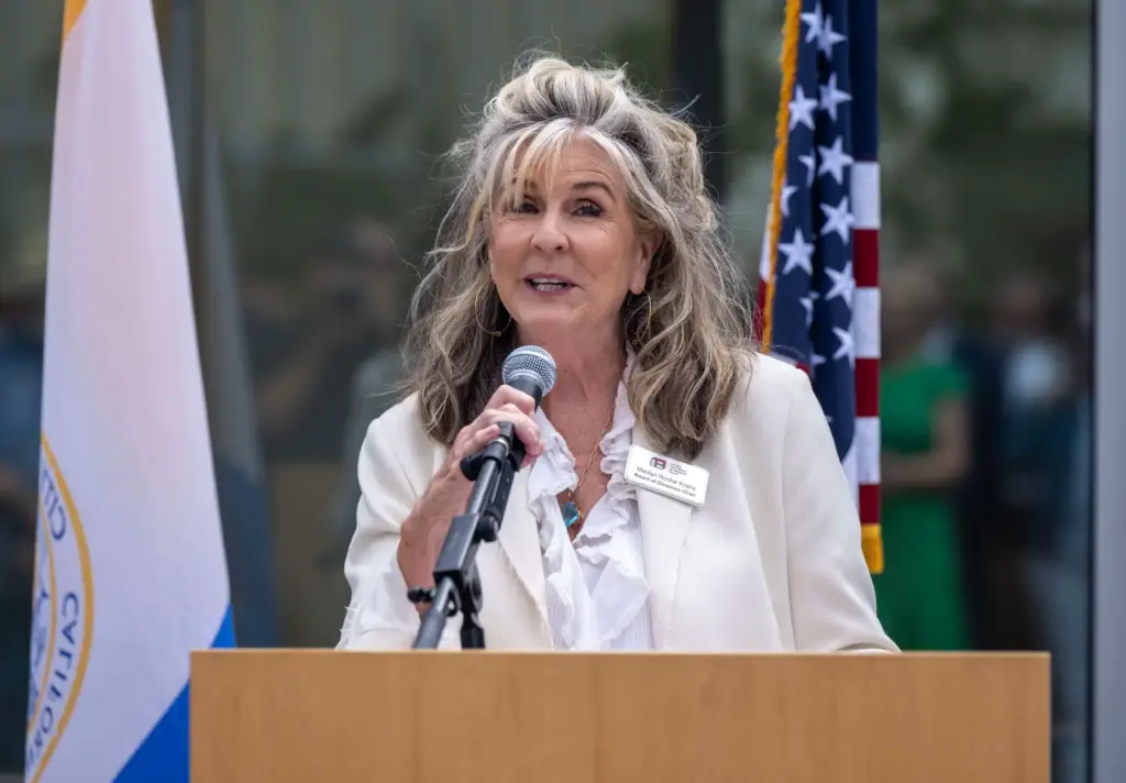 Marilyn Krahe, Newport Beach Library Foundation Chair, speaks during a...