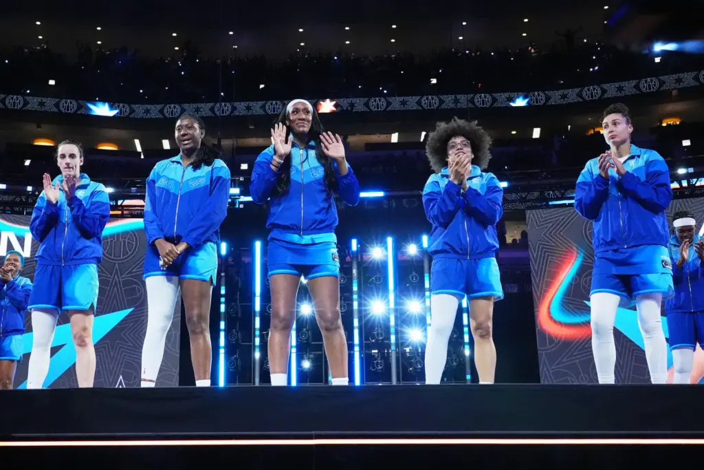 Left to right; Team Spoon’s Caitlin Clark, Aliyah Boston, A’Ja...