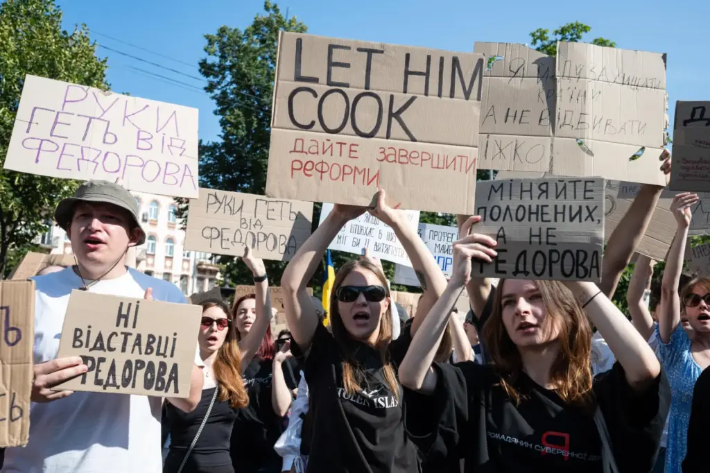 Ukrainians gather to denounce President Volodymyr Zelenskyy’s decision to dismiss...