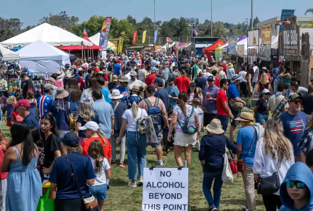 Hundreds arrive at the BBQ Music Fest at Oso Viejo...