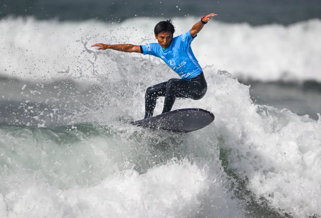 Taka Inoue competes during the elimination round for the longboard...