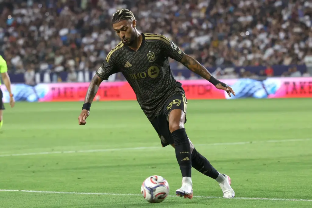 LAFC forward Denis Bouanga kicks the ball during the first...