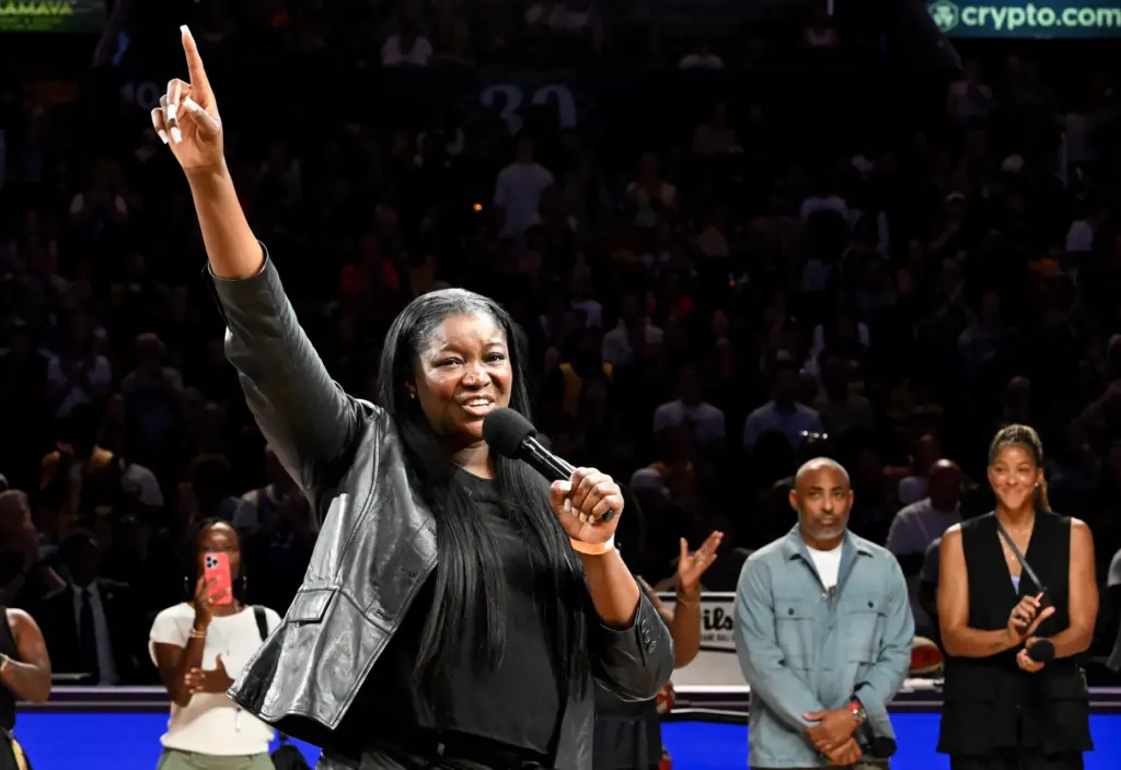 Former Sparks star DeLisha Milton-Jones speaks to the crowd during...