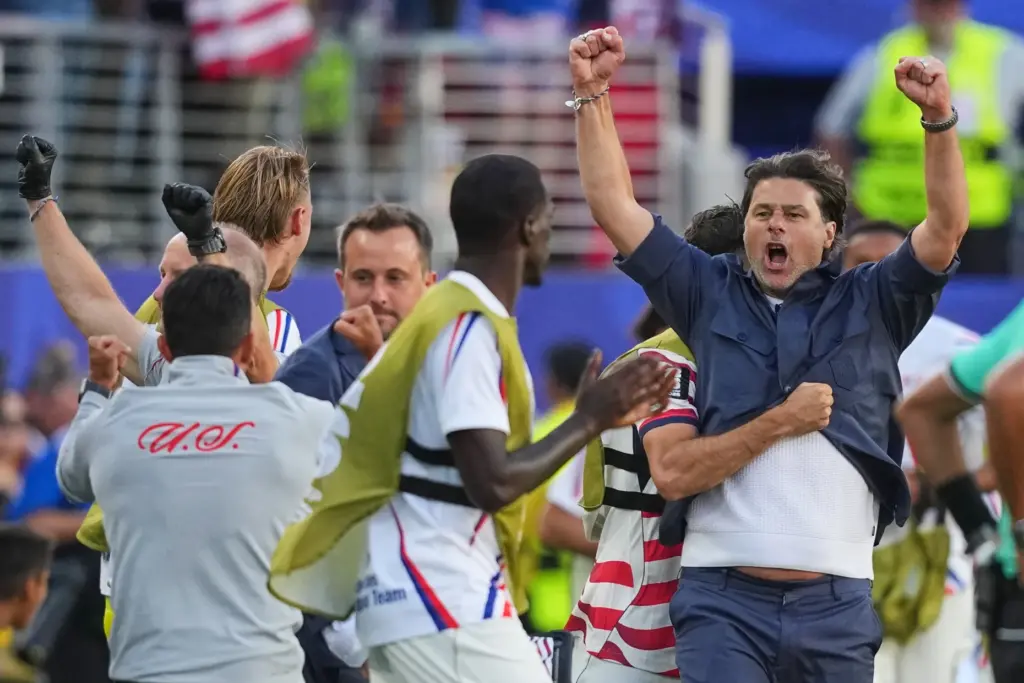 United States head coach Mauricio Pochettino, right, celebrates with his...
