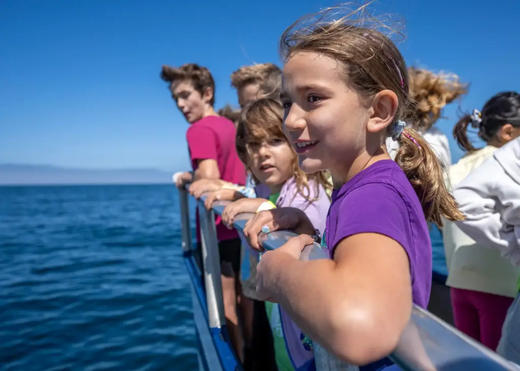 Calia Cosma, 8, of Yucaipa, holds onto a railing as...