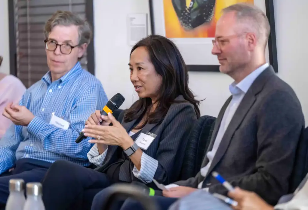 Tami Bhaumik, center, Vice President of Civility and Partnerships at...