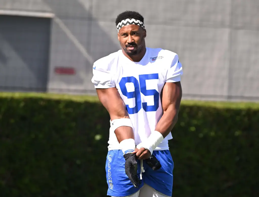 Rams edge rusher Myles Garrett walks on the field during...