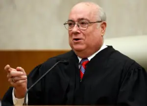 Judge weighs bid to block or reverse transfers of transgender inmates into a segregated prison unit