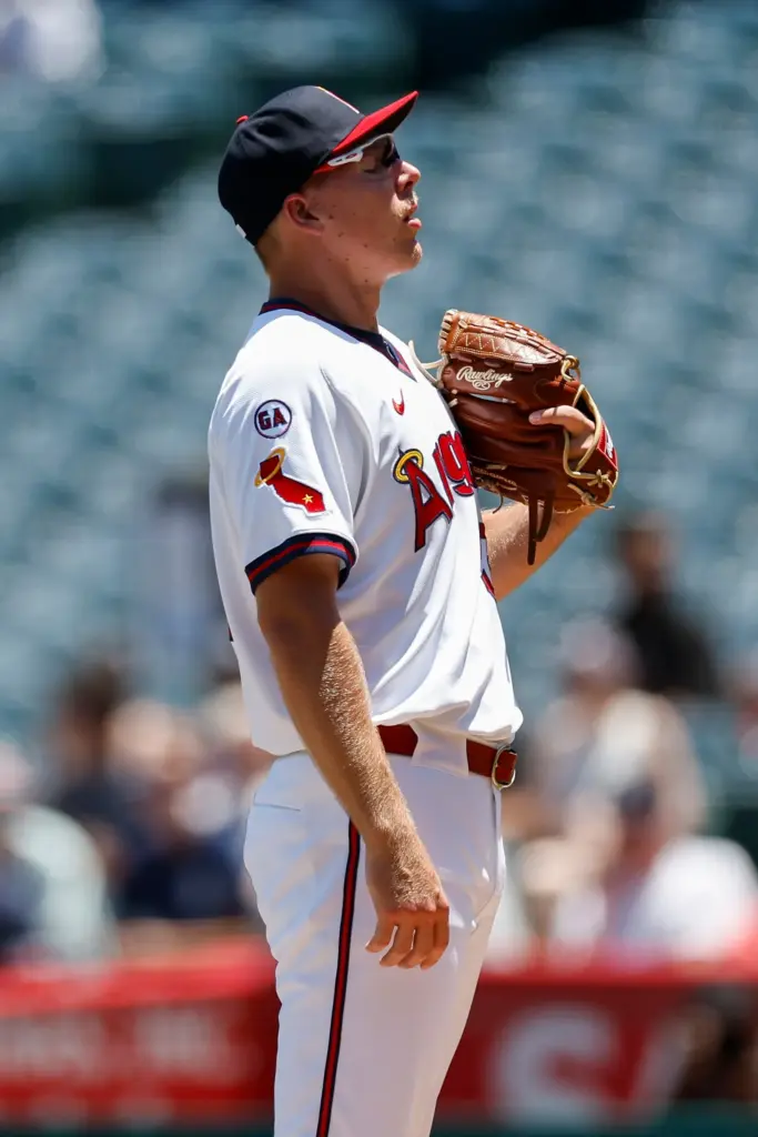 Angels starting pitcher Ryan Johnson takes a moment in between...