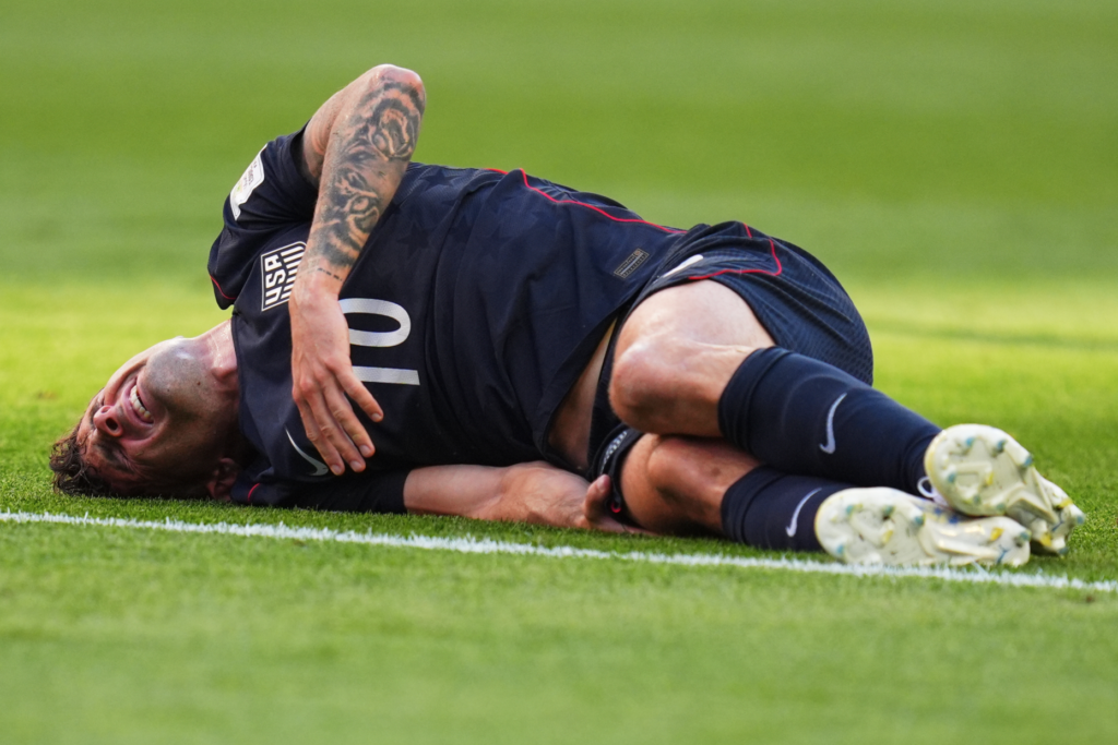 United States’ Christian Pulisic reacts after a challenge during the...