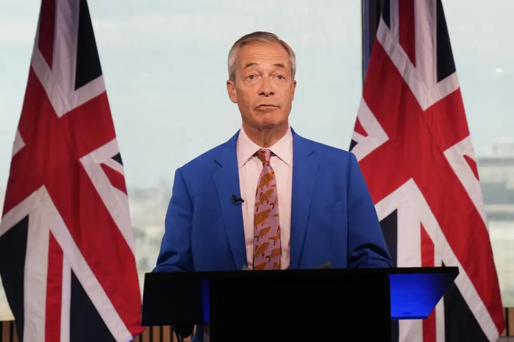 Reform UK leader Nigel Farage makes a statement to the media.