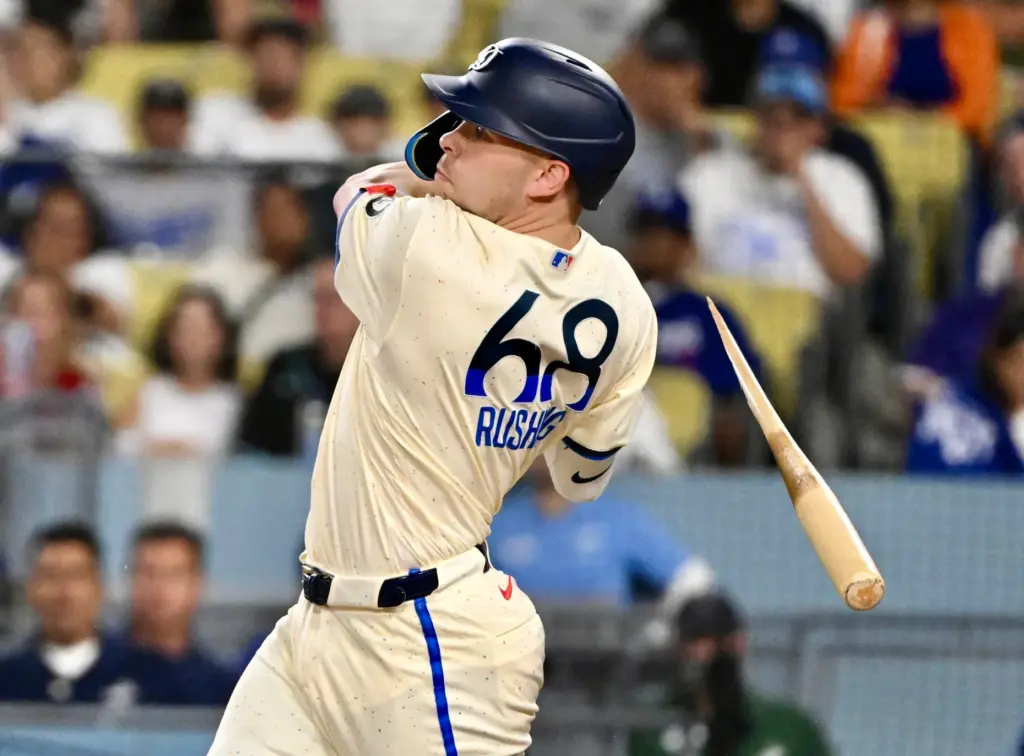 Daulton Rushing of the Dodgers lines out and breaks his...