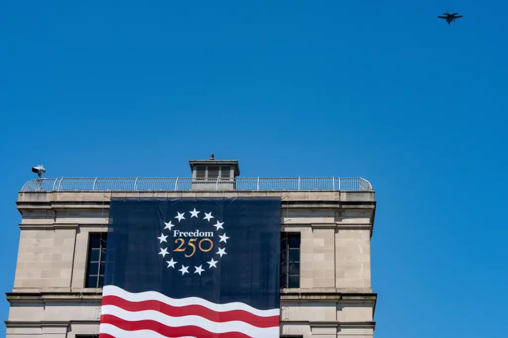 A military jet does a flyover of the National Mall,...