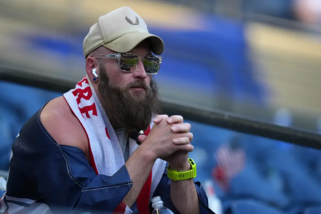 A United States’ fan sits in the stands after the...