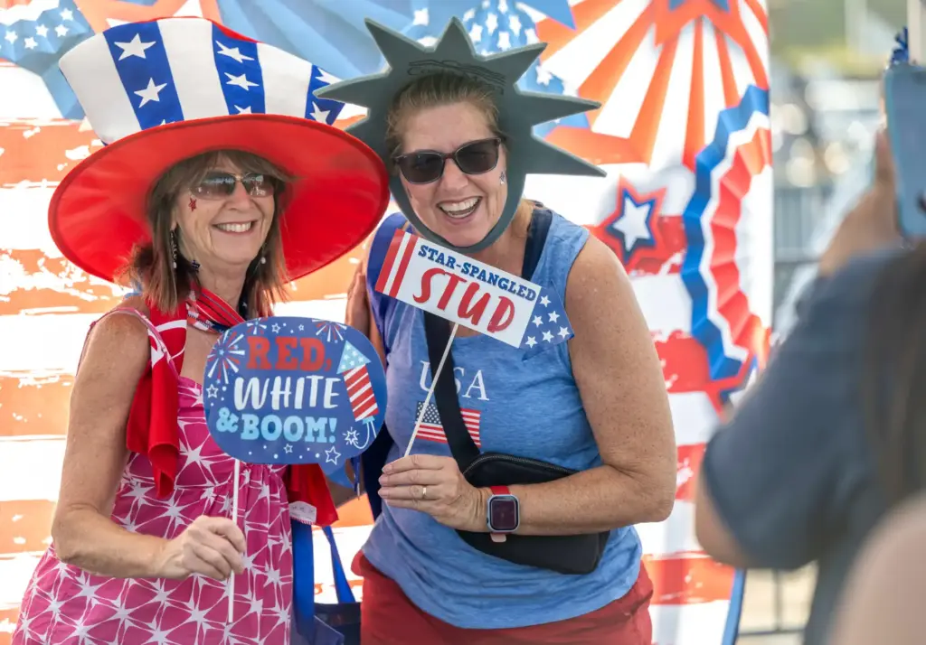 Friends Laura Luca, left, of Costa Mesa and Andrea Barnett...