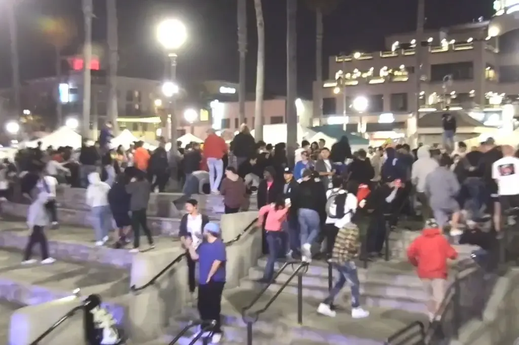 Many attendees of a party in Huntington Beach turn to...