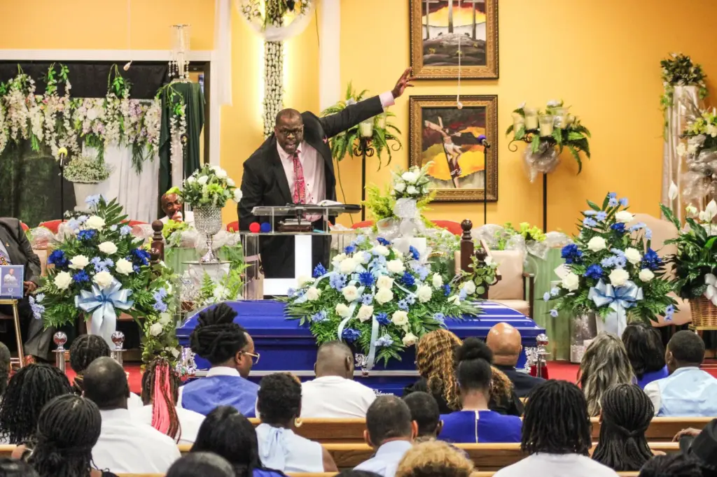 Tommy Robinson Jr. delivers the eulogy at Lloyd Gilmore's funeral.
