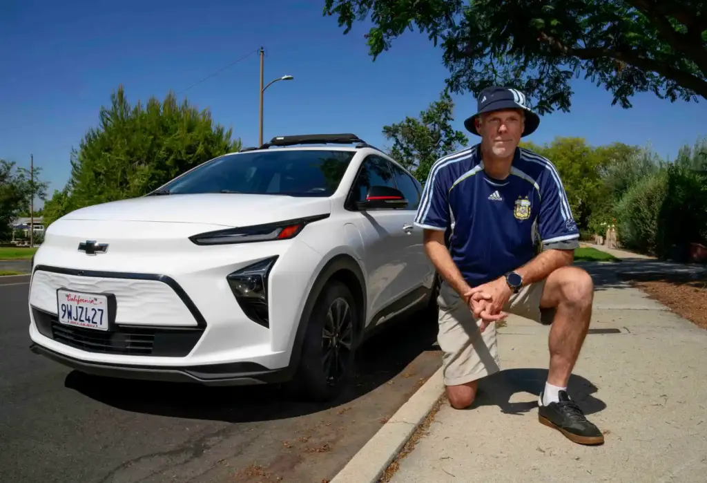 Tim Tipping with his 2023 Chevrolet Bolt EV in Claremont...