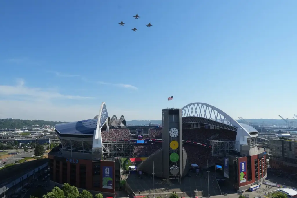 Jets perform a flyover over Seattle Stadium before the World...