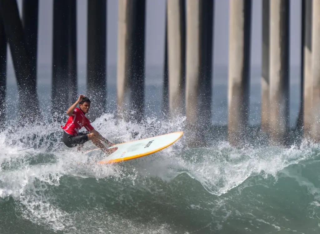 Rogelio Esquievel of the Philippines catches a wave just south...
