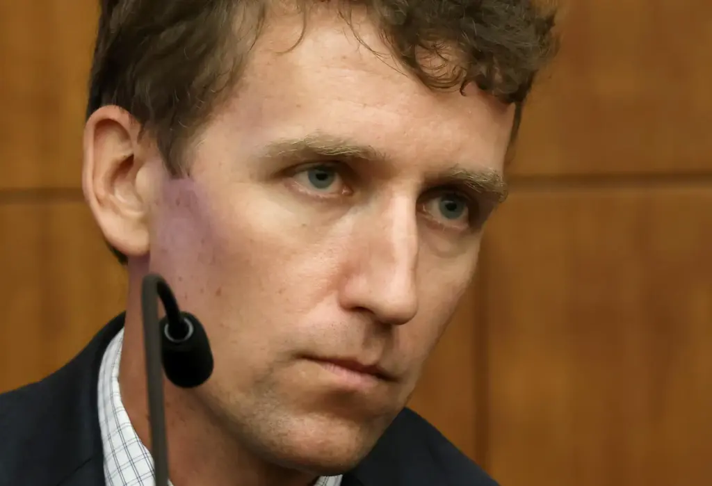 Patrick Clancy sits on the stand during the Lindsay Clancy murder trial.