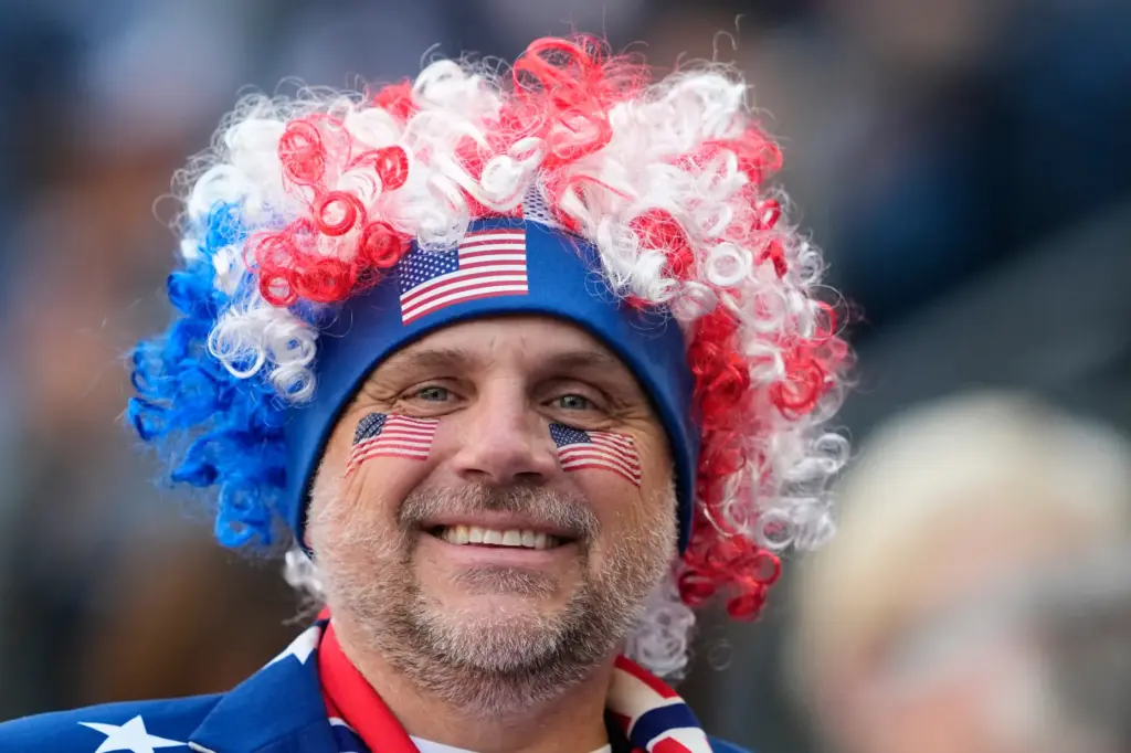 A US fan reacts ahead of the World Cup round...