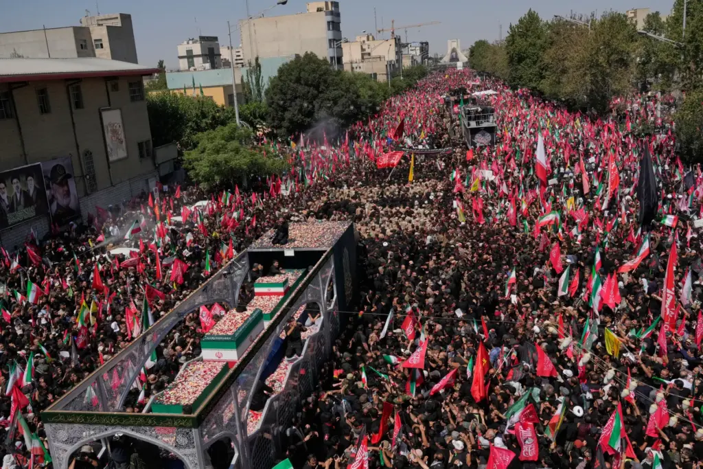 The truck carrying the coffins of Iranian Supreme Leader Ayatollah Ali Khamenei and family members.