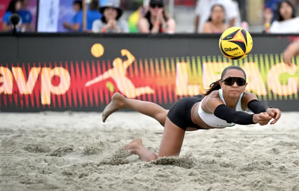 Alaina Chacon, with L.A. Launch, digs for the ball against...