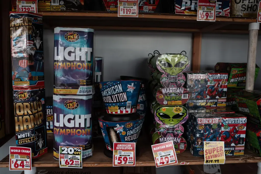Packages of fireworks are displayed at a TNT Fireworks stand...