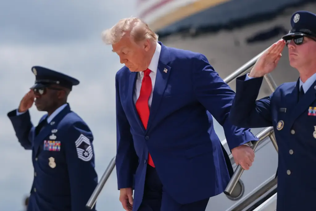 President Donald Trump arrives on Air Force One at Dobbins...
