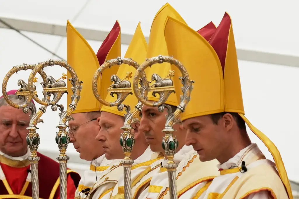 Newly consecrated Bishops Marc Hanappier, Michel Poinsinet de Sivry, Michael Goldade and Pascal Schreiber.