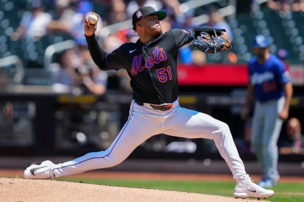 New York Mets pitcher Freddy Peralta (51) throws during the...