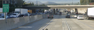 You can cross those single, solid white lines on the freeway