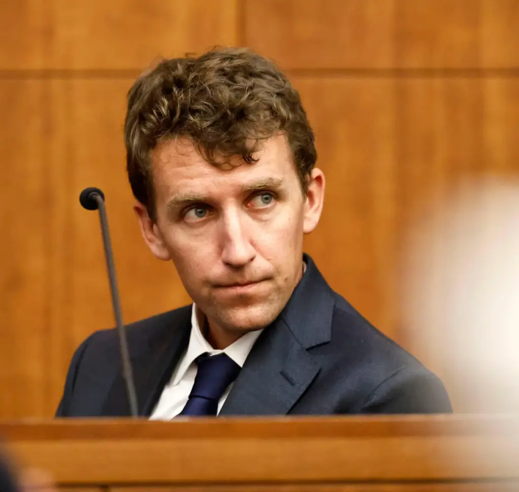 Patrick Clancy glances over at the defense table and his ex-wife Lindsay Clancy.