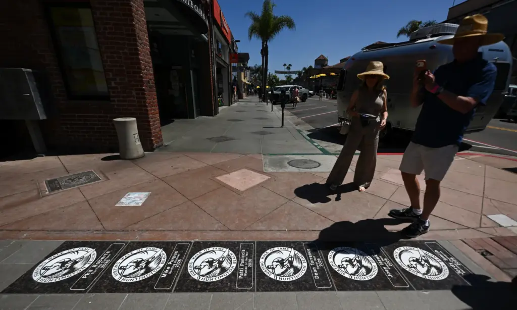 New plaques feature the 2026 Surfing Walk of Fame inductees...