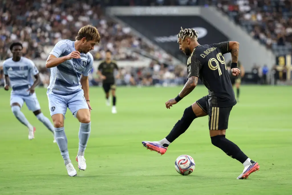 Los Angeles FC forward Denis Bouanga (99) controls the ball...