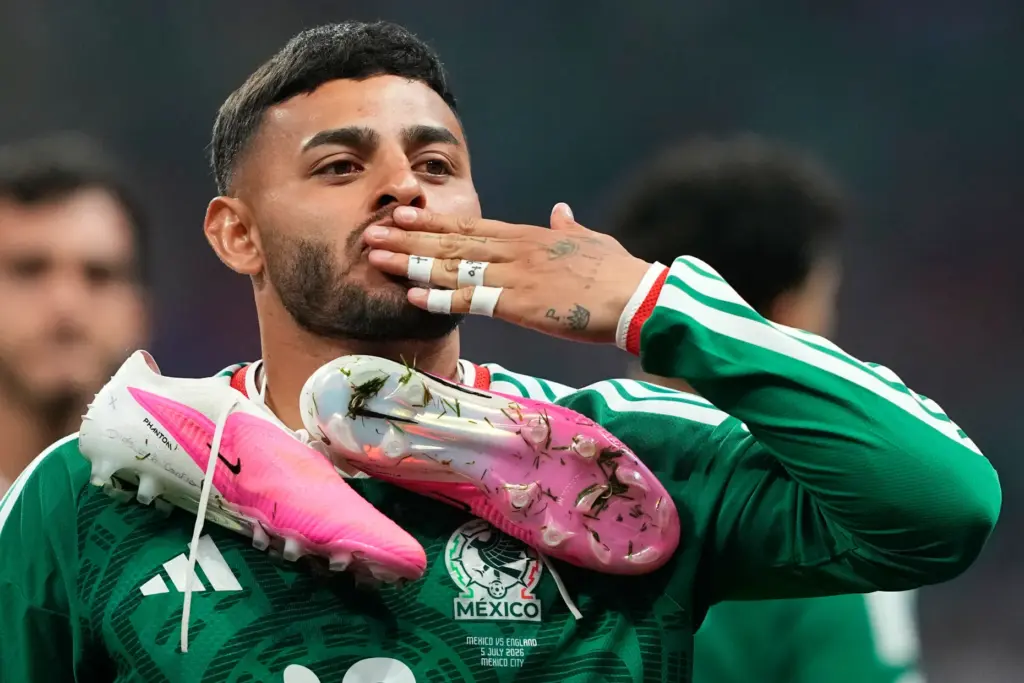 Mexico’s Alexis Vega (10) gestures to fans following during the...