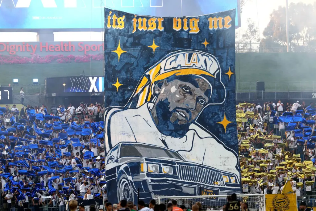 Galaxy supporters raise a tifo before an MLS match against...