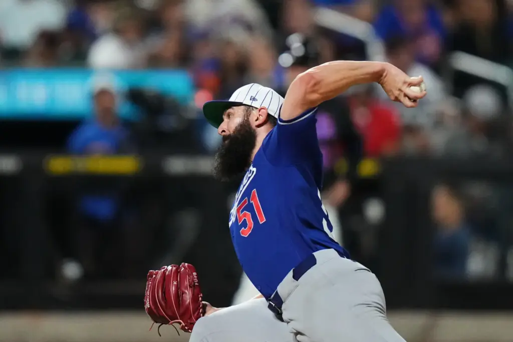 Dodgers’ Alex Vesia (51) pitches during the seventh inning of...