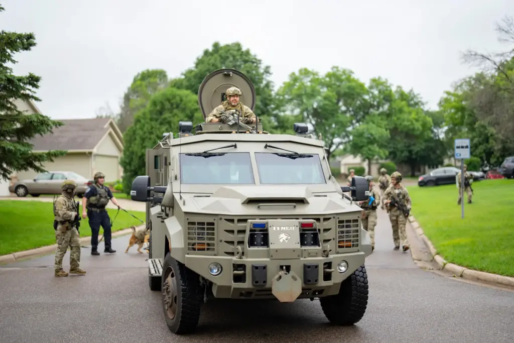 Armed FBI agents search for an active shooter in Brooklyn Park, Minnesota.