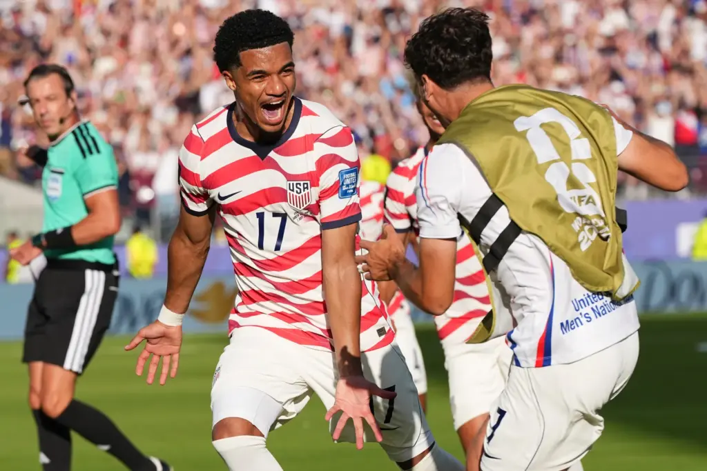 The United States’ Malik Tillman (17) celebrates with United States’...
