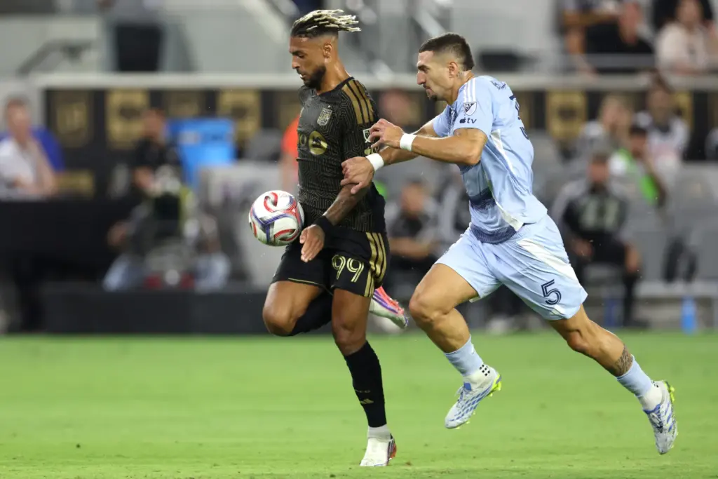 Los Angeles FC forward Denis Bouanga (99) recovers the ball...