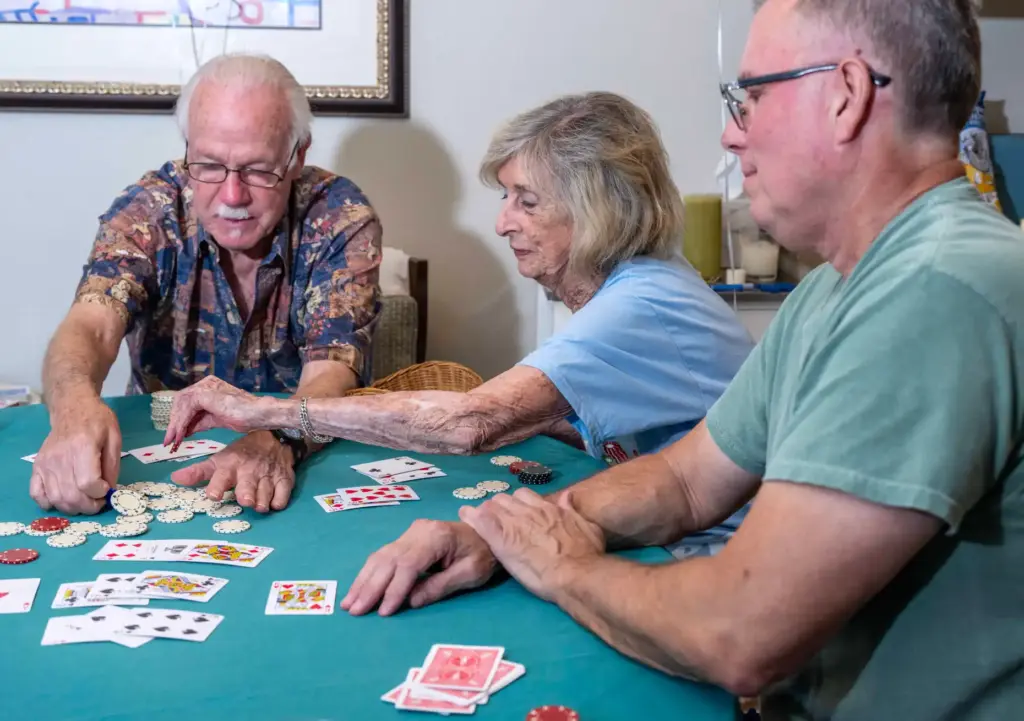 Dorothy Dahms, center, 97, who has been hosting a weekly...