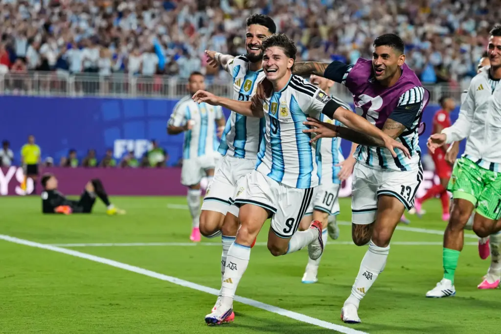 Argentina’s Julian Alvarez (9) celebrates after scoring his side’s second...