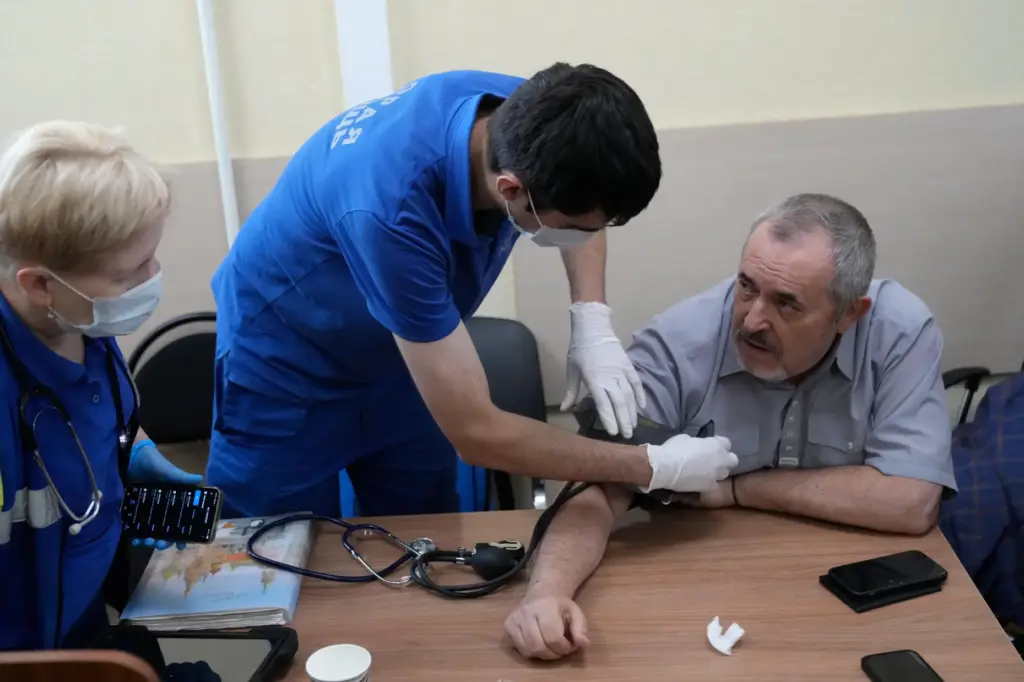 Emergency medical personnel provide care to Russian politician Boris Nadezhdin.