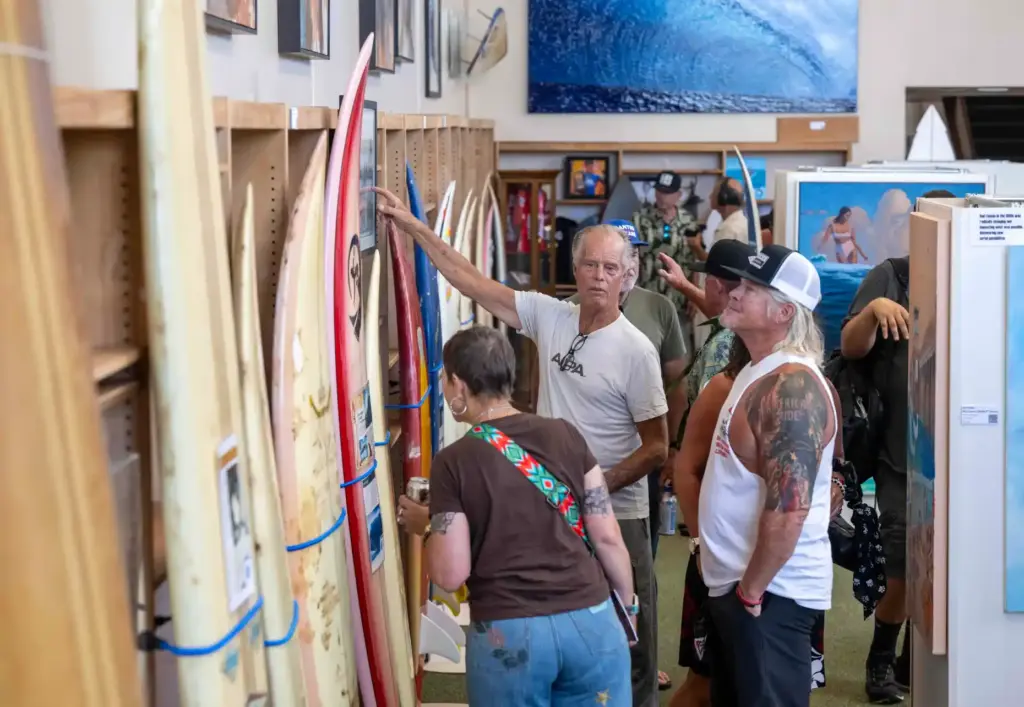 Visitors check out a temporary exhibit commemorating the 50th anniversary...