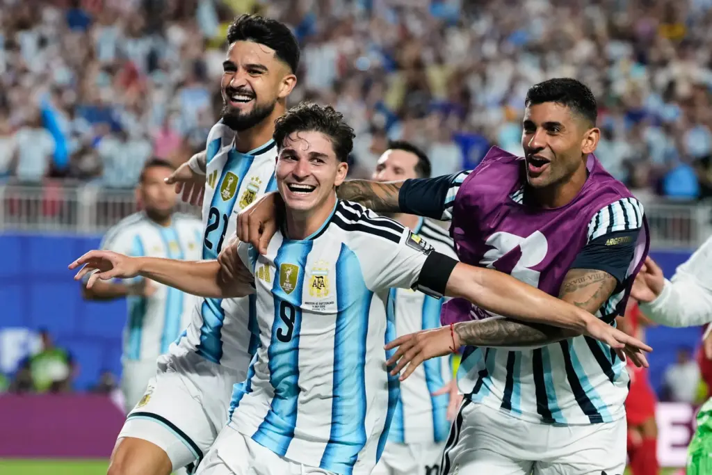 Argentina’s Julian Alvarez (9) celebrates after scoring his side’s second...