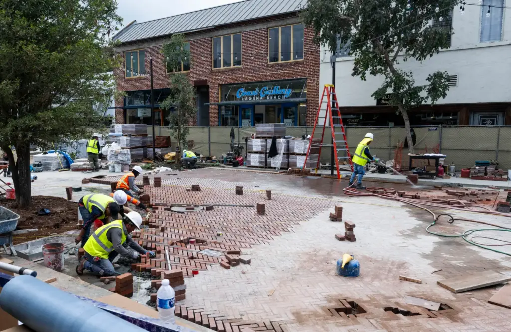 Work continues on the promenade along Forest Ave. in Laguna...